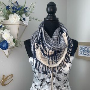 Infiniti scarf with fringe, like new.